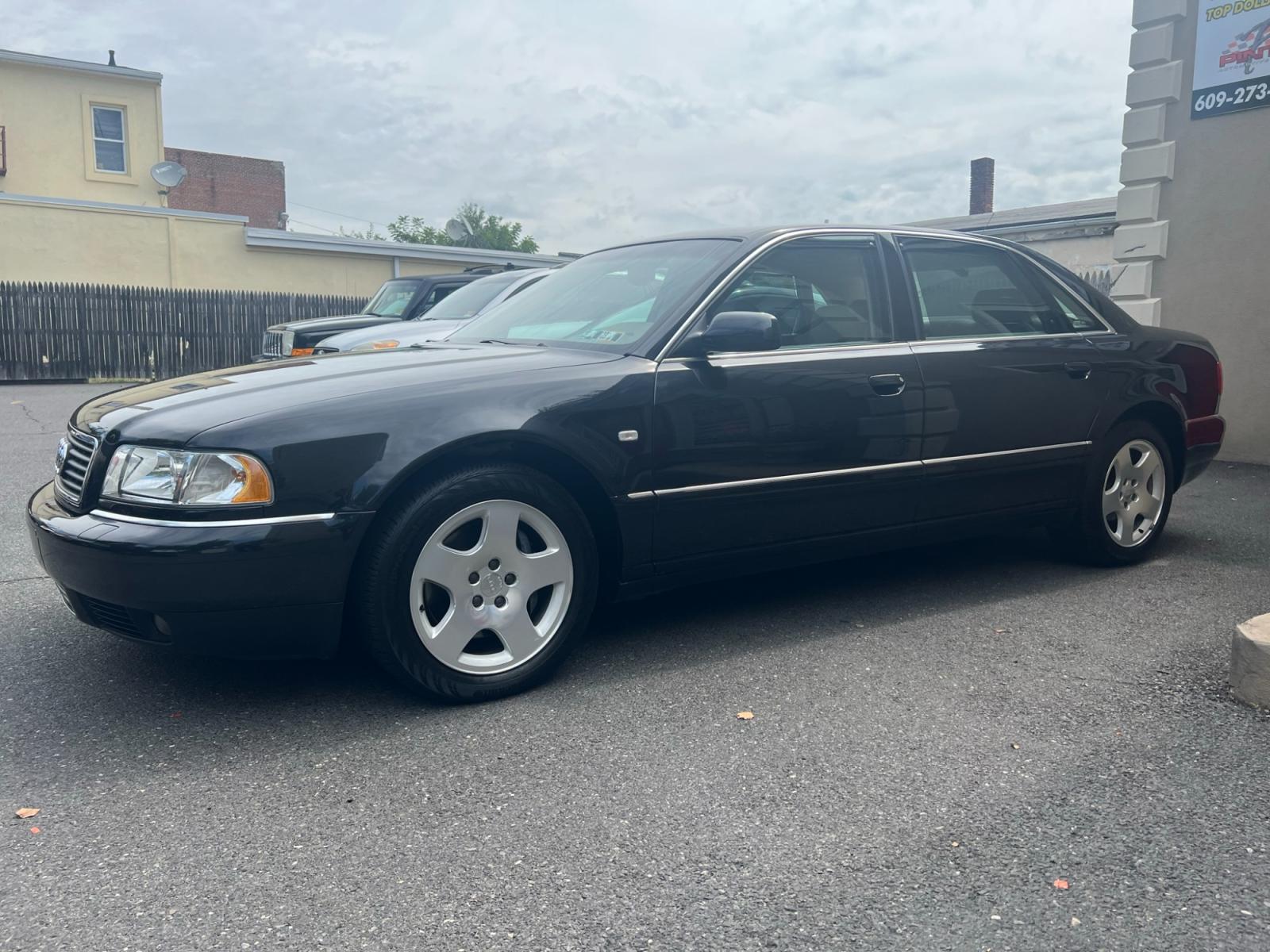 2001 BLACK /Beige leather Audi A8 (WAUML54DX1N) , located at 1018 Brunswick Ave, Trenton, NJ, 08638, (609) 989-0900, 40.240086, -74.748085 - This is a very special vehicle! 1 owner that has been kept in the garage since brand new!! Fully serviced throughout the years and is still like Brand New with no dings, dents or scratches! A truly must see to appreciate as the original price of this car was over $70,000!! Please call Anthony to set - Photo #2